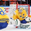 PRAGUE, CZECH REPUBLIC - MAY 3: Sweden's Anders Nilsson #31 goes down to make the save while Oscar Klefbom #84 looks on during preliminary round action at the 2015 IIHF Ice Hockey World Championship. (Photo by Andre Ringuette/HHOF-IIHF Images)

